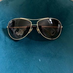 Ray-bans can be women’s or men’s. Brown.